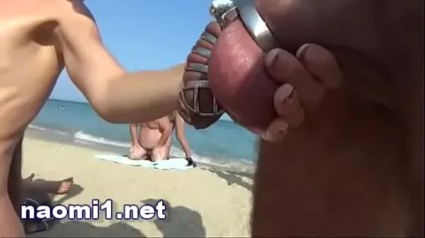 Tubo de unidad HD mear y corrida múltiple en una playa swinger cap d'agde