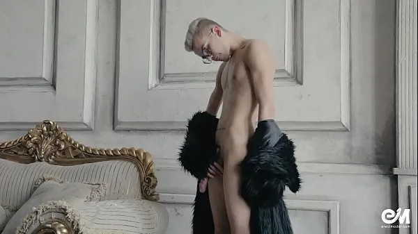 HD Blond twink boy nude in fur coat shows his long uncut cock أنبوب محرك الأقراص